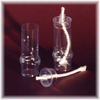 The long oil tubes with the wickholders and wicks